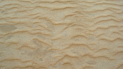 waves of sand on the beach
